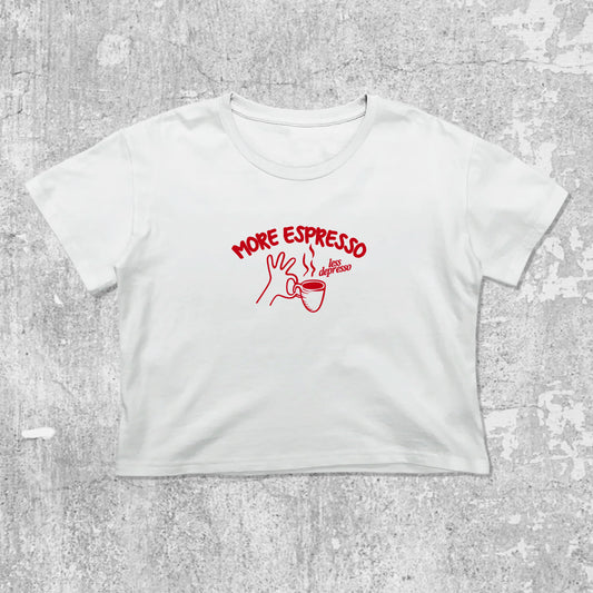 More Espresso Less Depresso graphic crop tee with cute and trendy fit, featuring playful coffee graphic, stylish cut. White crop t-shirt