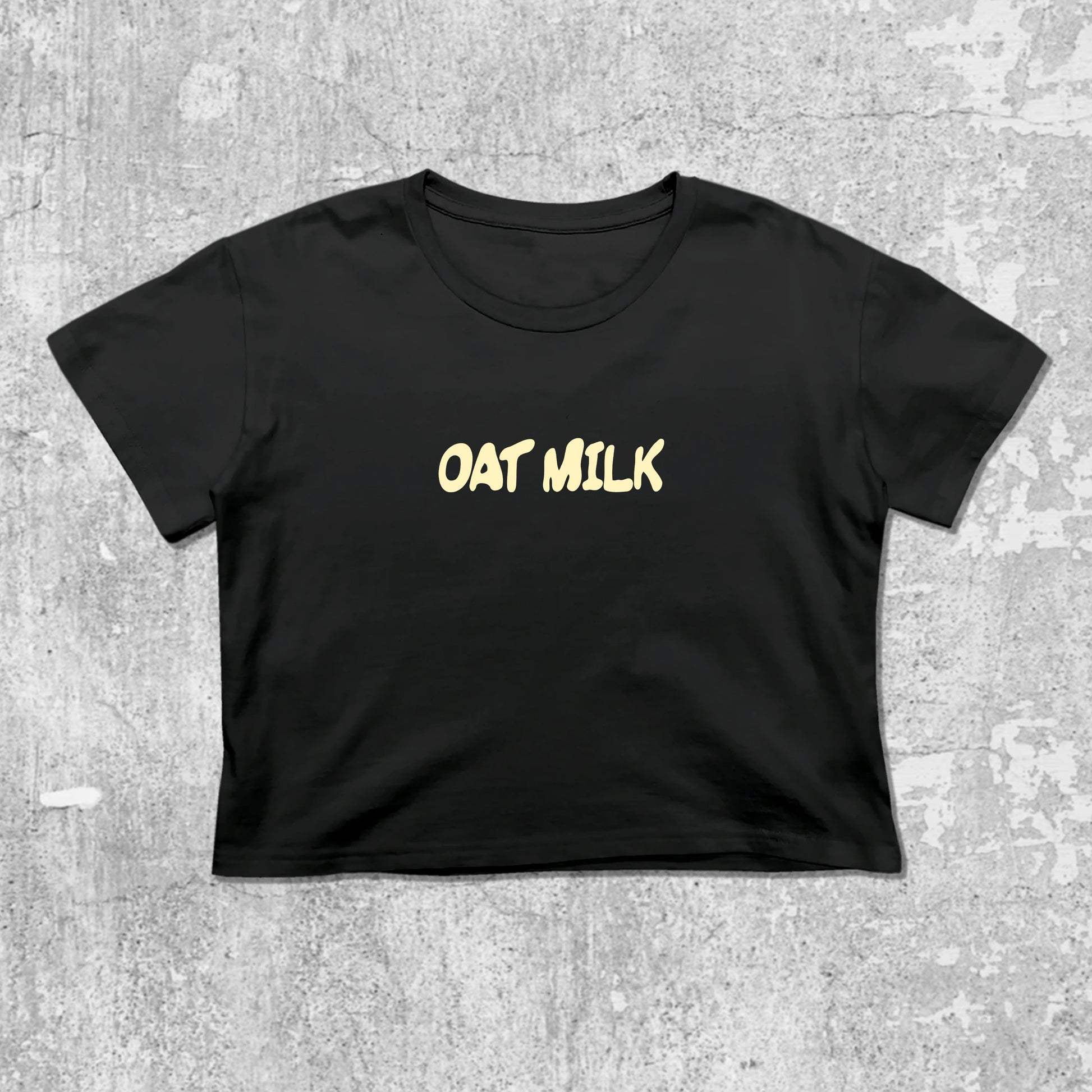 Oat Milk graphic crop tee with cute and trendy fit, featuring playful vintage graphic, stylish cut. Black crop t-shirt