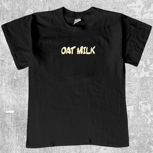 Oat Milk graphic tee with bold and humorous print, funny and trendy graphic. Perfect gifts for friends and family. Black shirt.