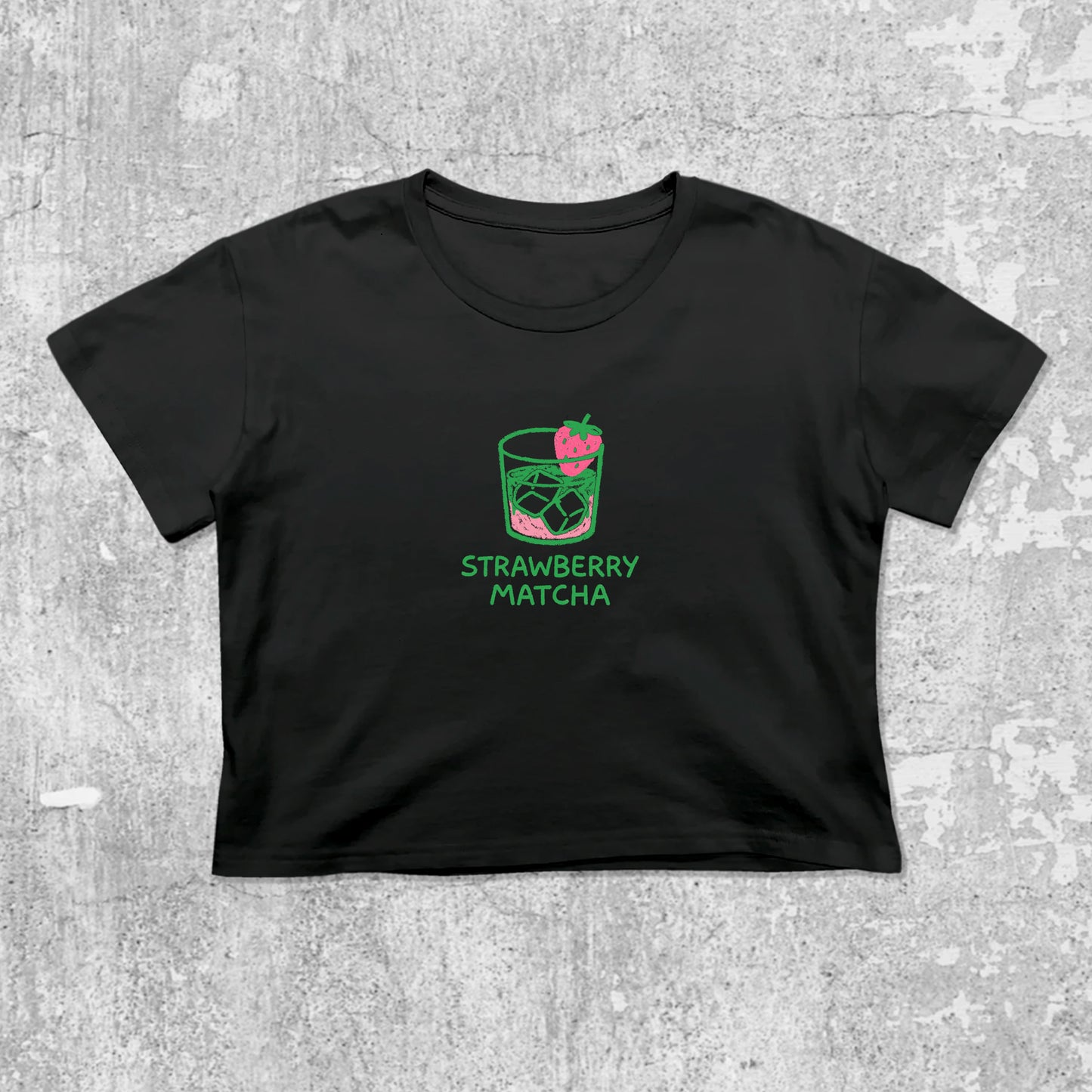 Strawberry Matcha graphic crop tee with cute and trendy fit, featuring playful vintage graphic, stylish cut. Black crop t-shirt