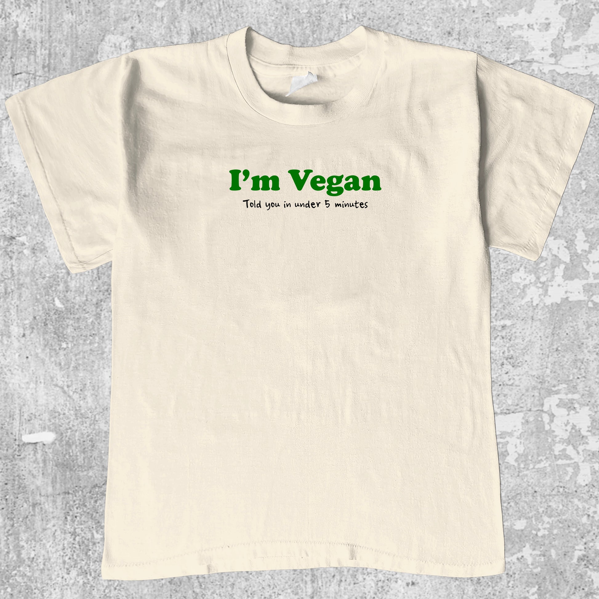 I'm Vegan graphic tee with bold and humorous print, funny and trendy graphic. Perfect for adults and gift-giving. Cream shirt.