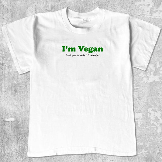 I'm Vegan graphic tee with bold and humorous print, funny and trendy graphic. Perfect for adults and gift-giving. White shirt.
