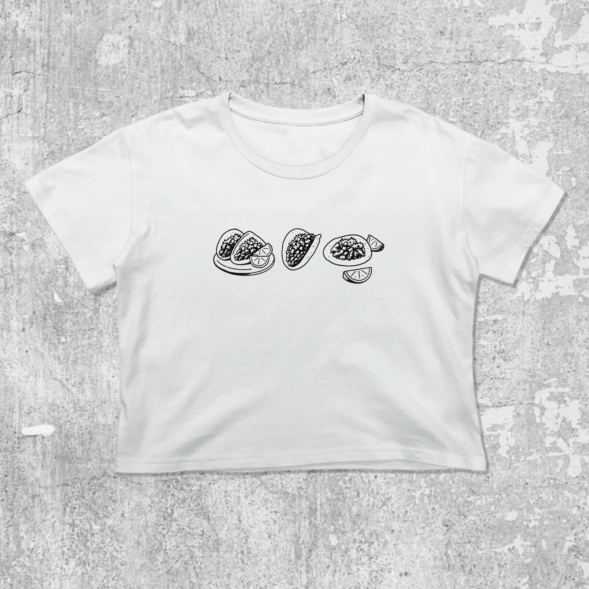 Tacos graphic crop tee with cute and trendy fit, featuring playful vintage graphic, stylish cut. White crop t-shirt