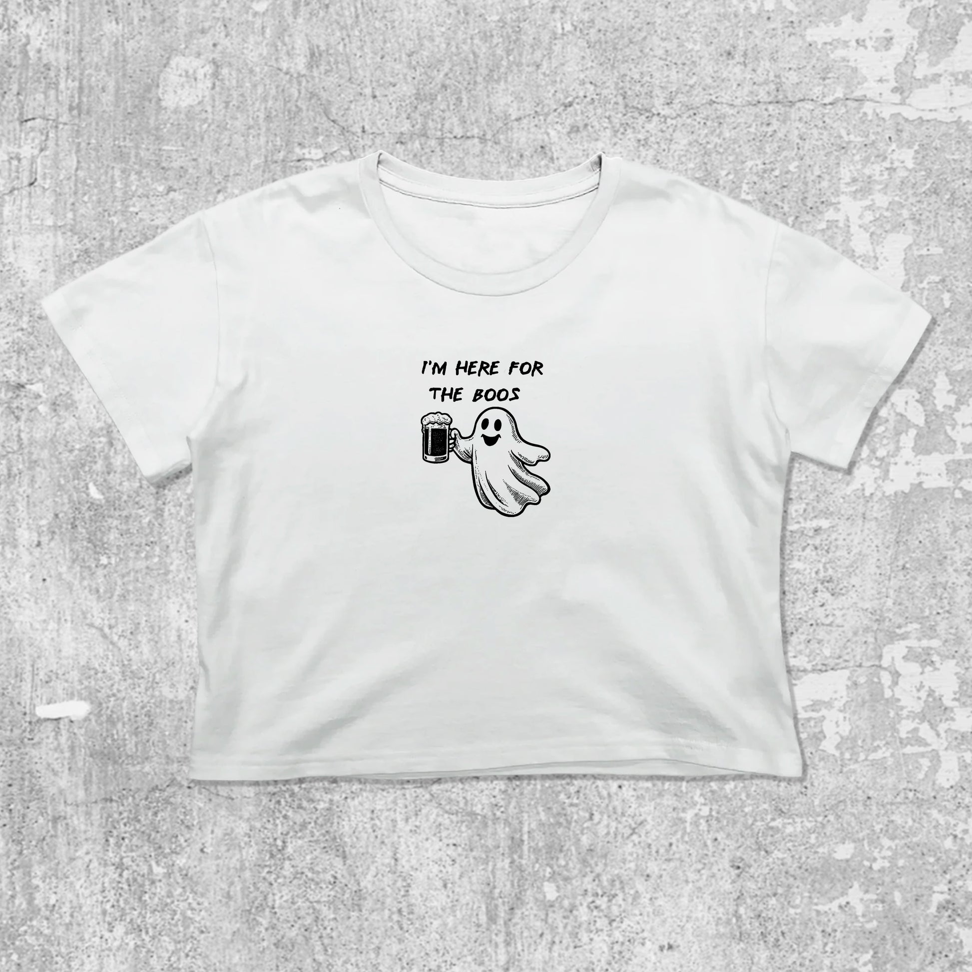 I'm Here For The Boos graphic crop tee with cute and trendy fit, featuring playful vintage graphic, stylish cut. White crop t-shirt