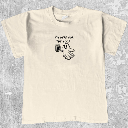 I'm Here For The Boos graphic tee with bold and humorous print, funny and trendy graphic. Perfect for special halloween. Cream shirt.