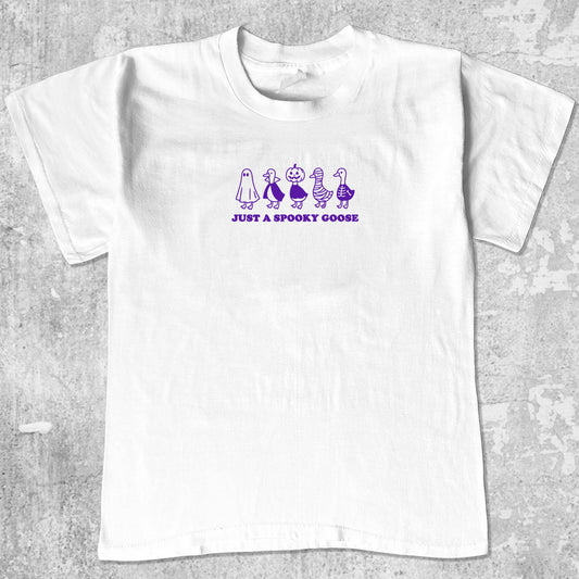 Just a Spooky Goose graphic tee with bold and humorous print, funny and trendy graphic. Perfect for special halloween. White shirt.