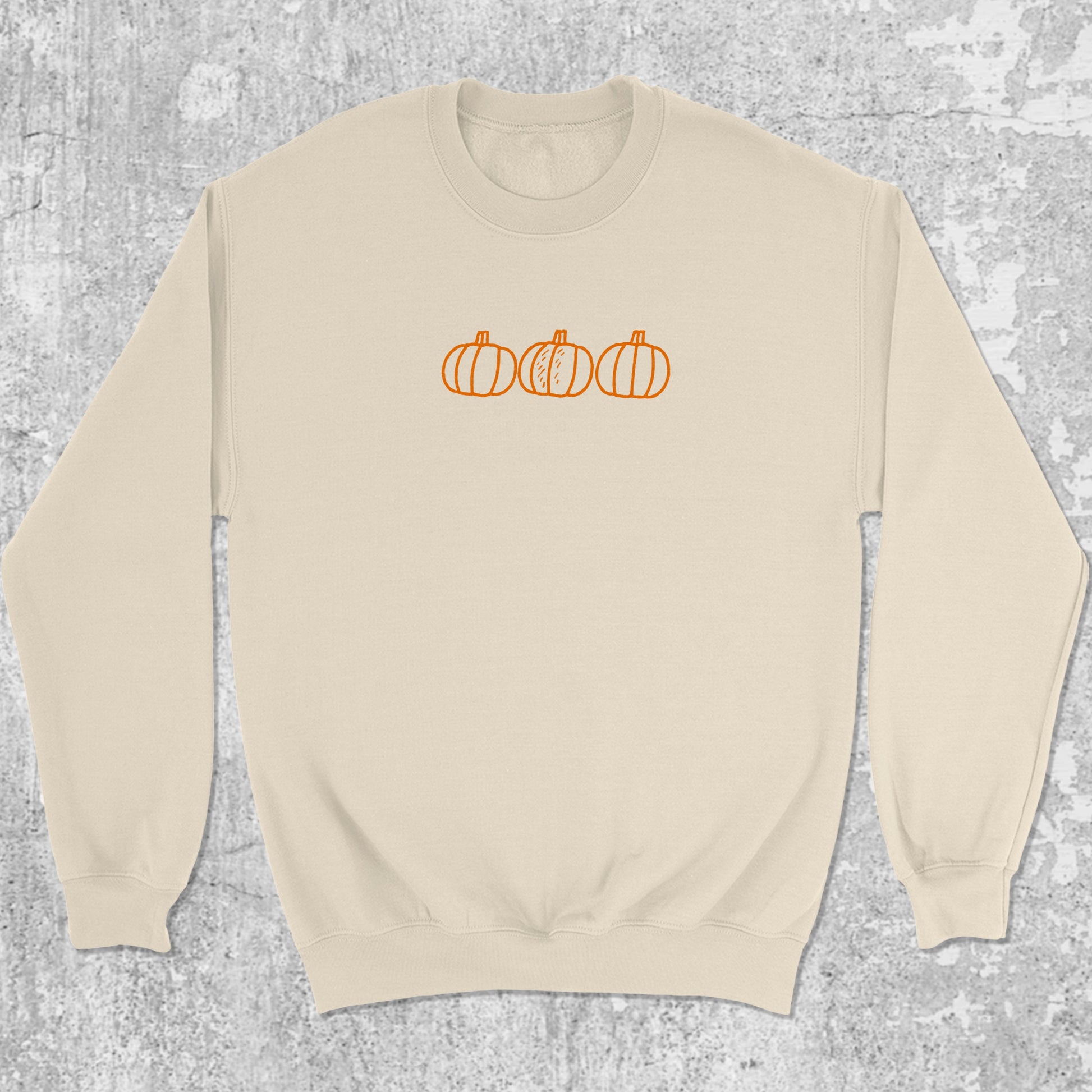 Pumpkins graphic sweatshirt with bold and humorous print, warm and cozy graphic for everyday wear. Perfect gifts for Halloween. Natural pullover.