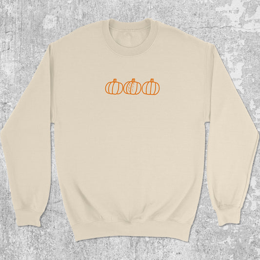 Pumpkins graphic sweatshirt with bold and humorous print, warm and cozy graphic for everyday wear. Perfect gifts for Halloween. Natural pullover.