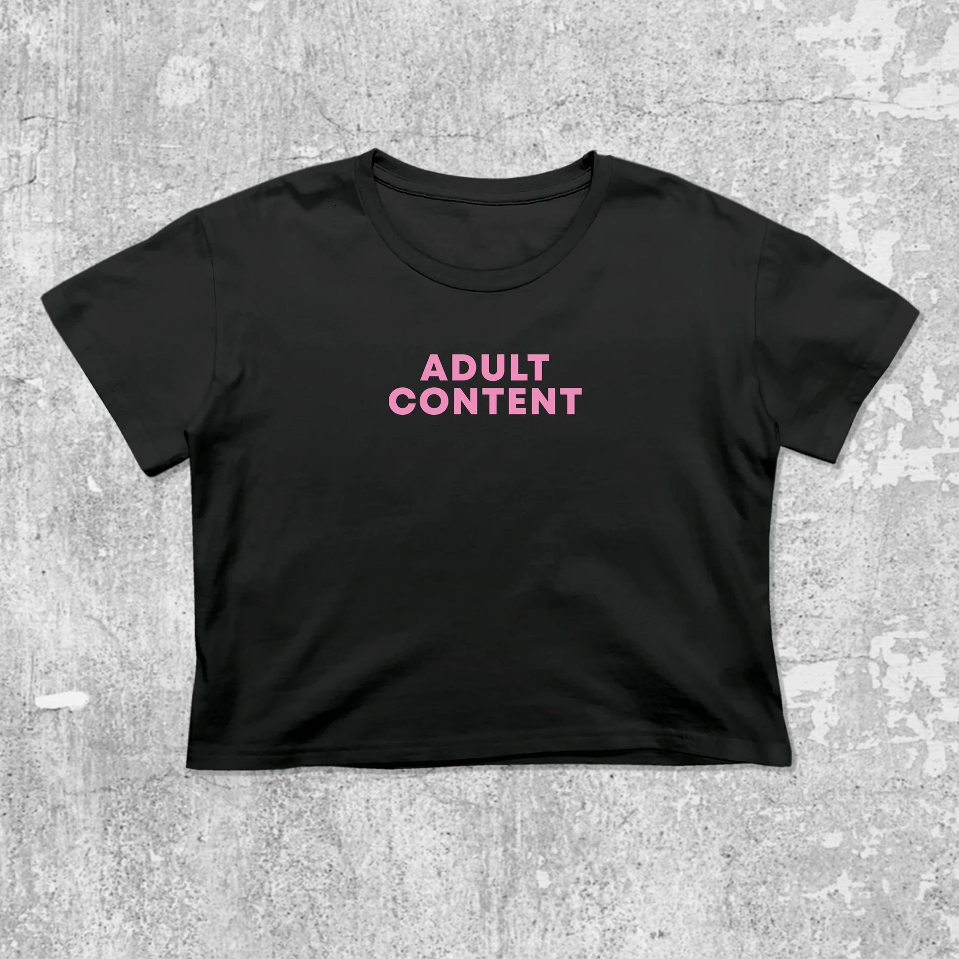 Adult Content graphic crop tee with cute and trendy fit, featuring playful vintage graphic, stylish cut. Black crop t-shirt