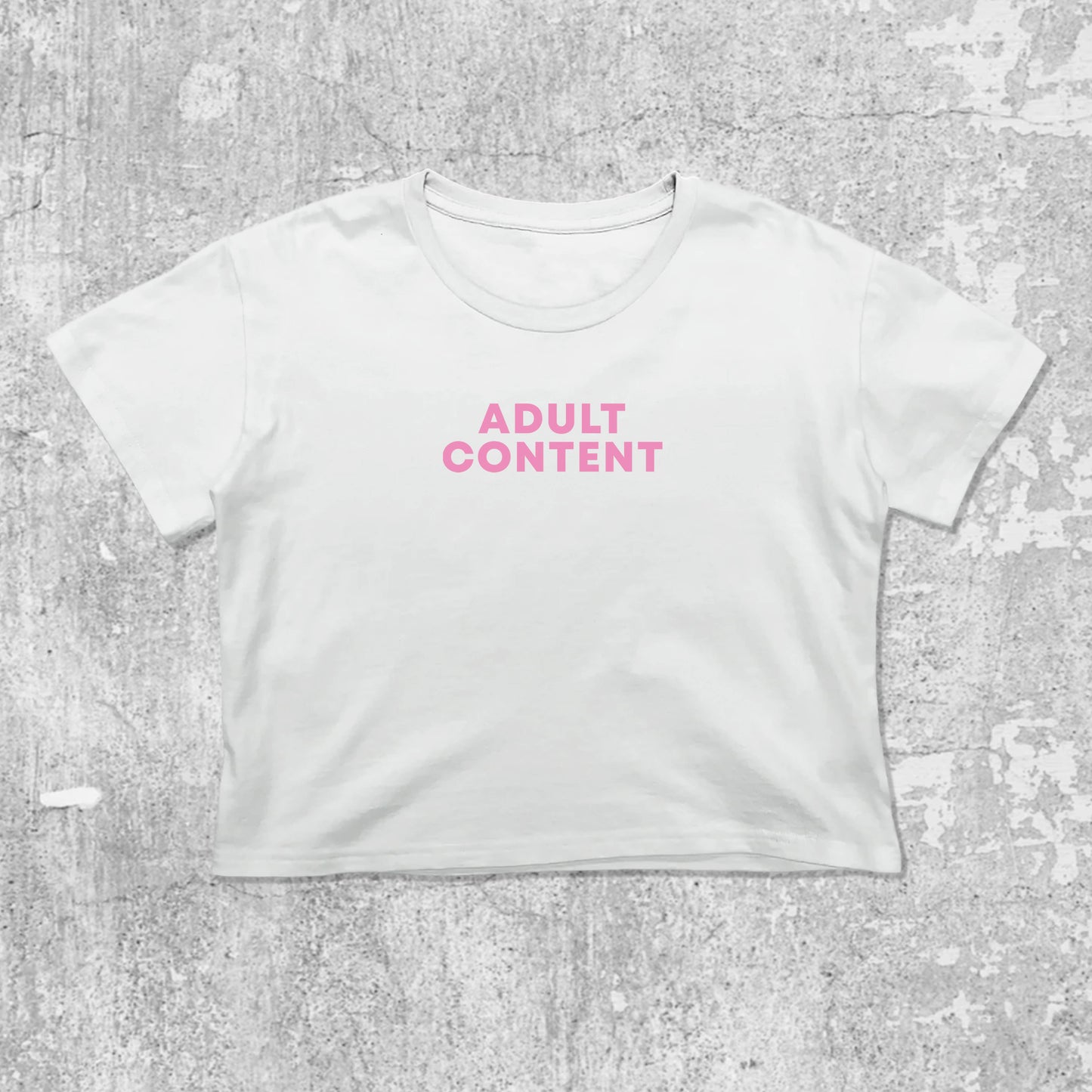 Adult Content graphic crop tee with cute and trendy fit, featuring playful vintage graphic, stylish cut. White crop t-shirt