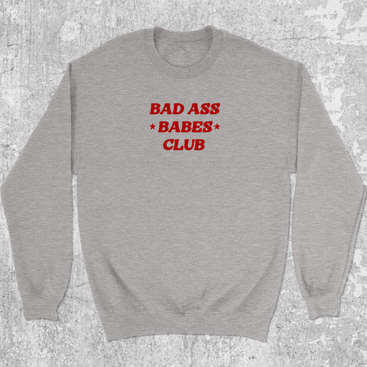 Bad Ass Babes Club graphic sweatshirt with cute and humorous print, warm and cozy graphic for everyday wear. Perfect for friends. Heather Grey pullover.