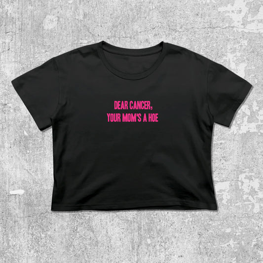 Dear Cancer Your Moms a Hoe graphic crop tee with cute and trendy fit, featuring playful vintage graphic, stylish cut. Black crop t-shirt