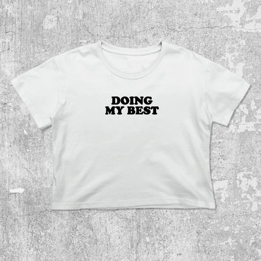 Doing My Best graphic crop tee with cute and trendy fit, featuring playful vintage graphic, stylish cut. White crop t-shirt