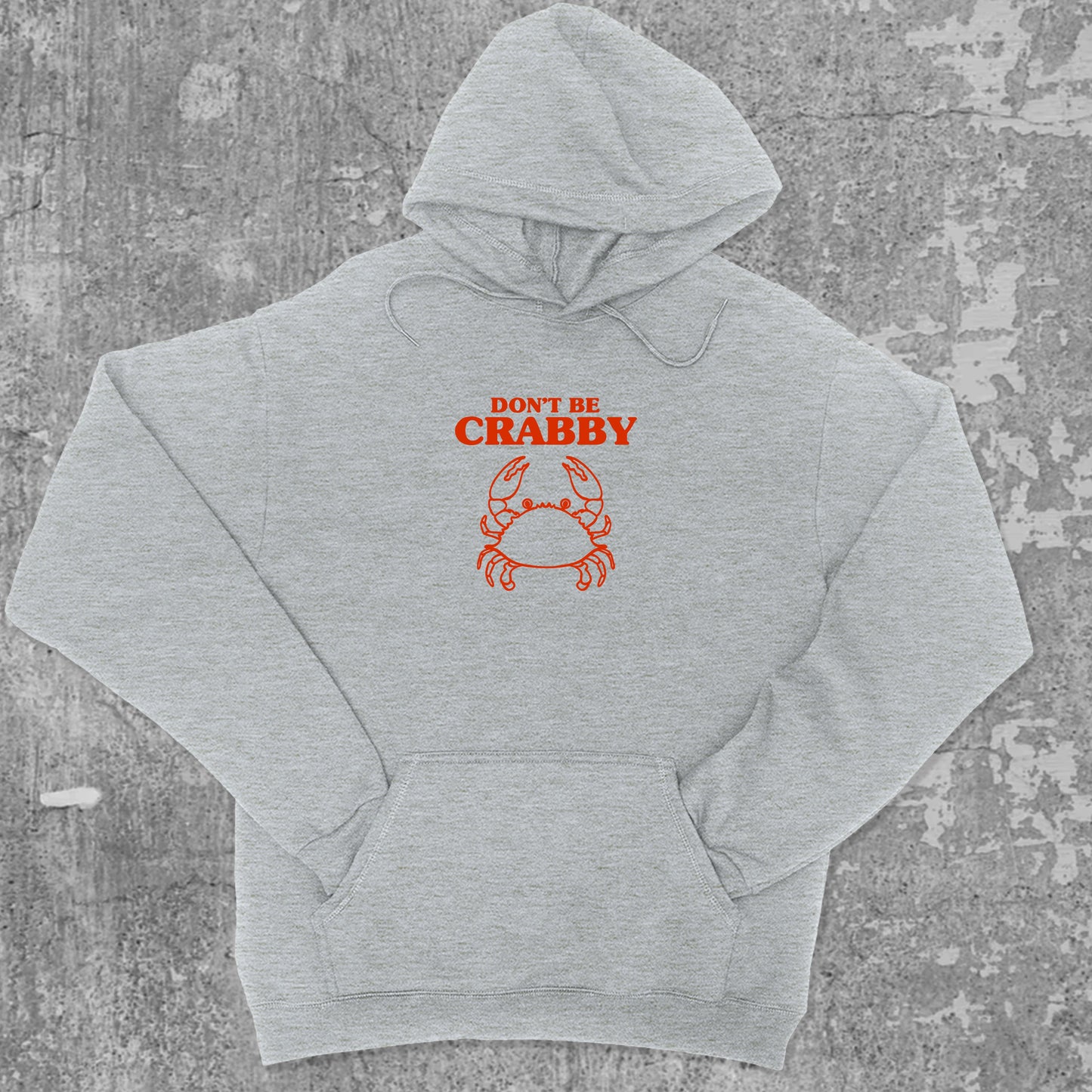 Don't Be Crabby graphic hoodie with funny and trendy artwork, casual streetwear with bold personality. Great for adults and gifting. Heather Grey hoodie.
