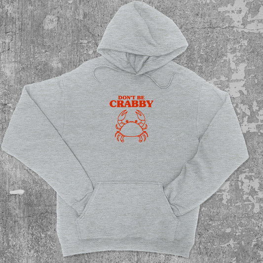 Don't Be Crabby graphic hoodie with funny and trendy artwork, casual streetwear with bold personality. Great for adults and gifting. Heather Grey hoodie.