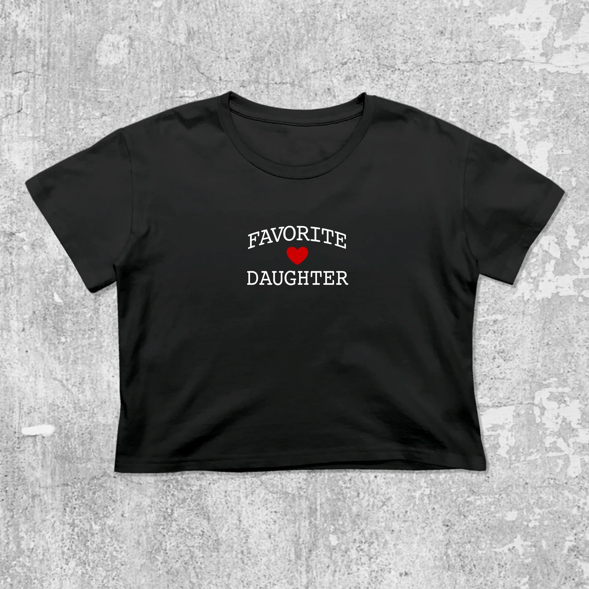 Favorite Daughter graphic crop tee with cute and trendy fit, featuring playful vintage graphic, stylish cut. Black crop t-shirt