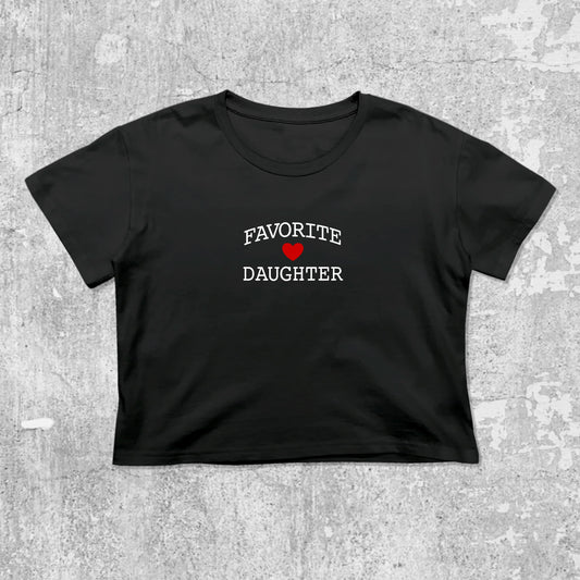 Favorite Daughter graphic crop tee with cute and trendy fit, featuring playful vintage graphic, stylish cut. Black crop t-shirt