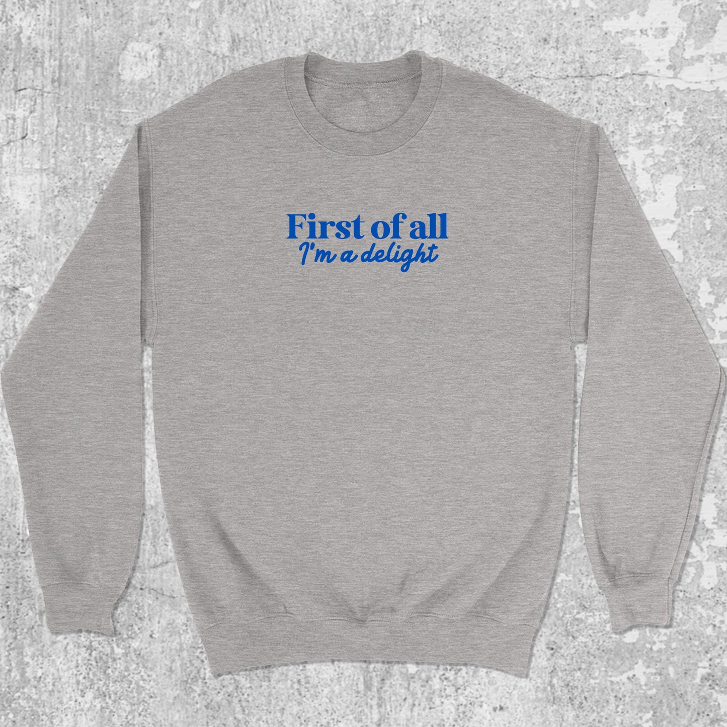 First of All I'm a Delight graphic sweatshirt with bold and humorous print, warm and cozy graphic for everyday wear. Perfect gifts for family and friends. Heather Grey pullover.