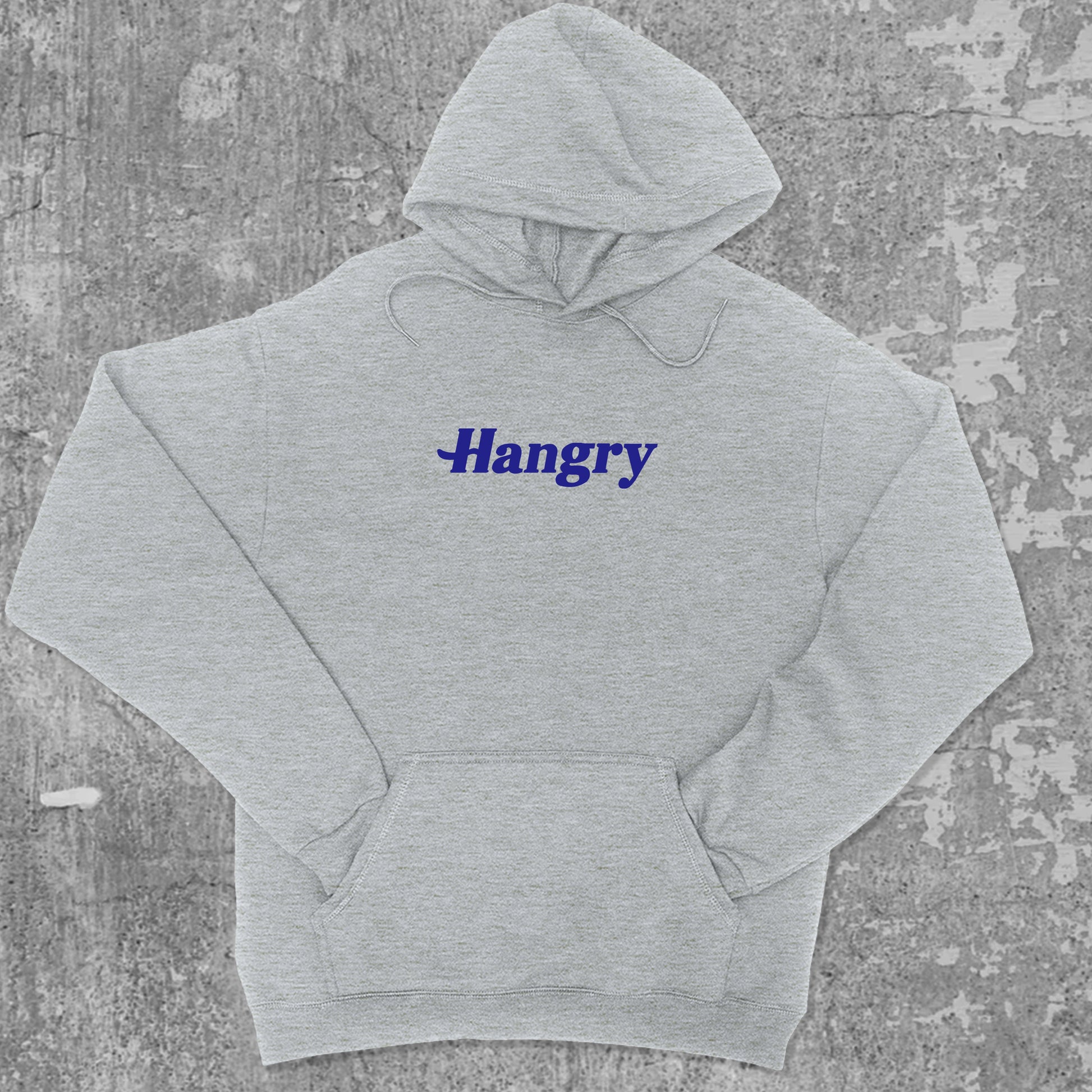Hangry graphic hoodie with funny and trendy artwork, casual streetwear with bold personality. Great for adults and gifting. Heather Grey hoodie.