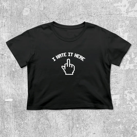 I Hate It Here graphic crop tee with cute and trendy fit, featuring playful vintage graphic, stylish cut. Black crop t-shirt