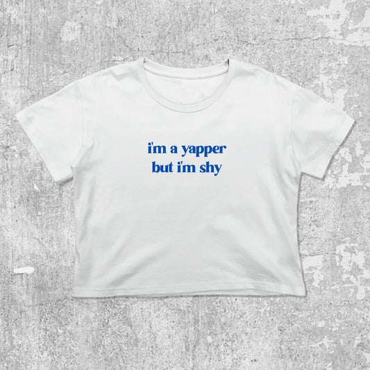 I'm A Yapper But I'm Shy graphic crop tee with cute and trendy fit, featuring playful vintage graphic, stylish cut. White crop t-shirt