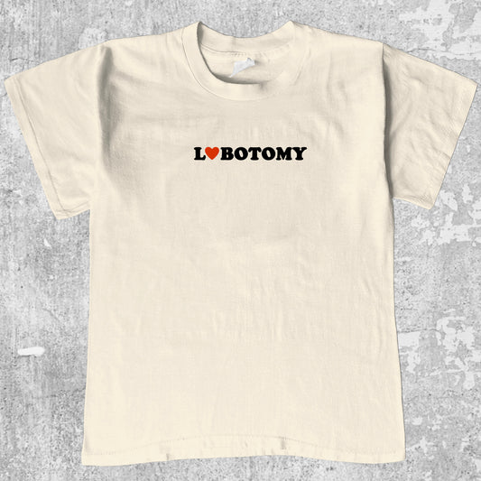 Lobotomy graphic tee with retro and humorous print, funny and trendy graphic. Perfect for adults and gift-giving. Cream shirt.