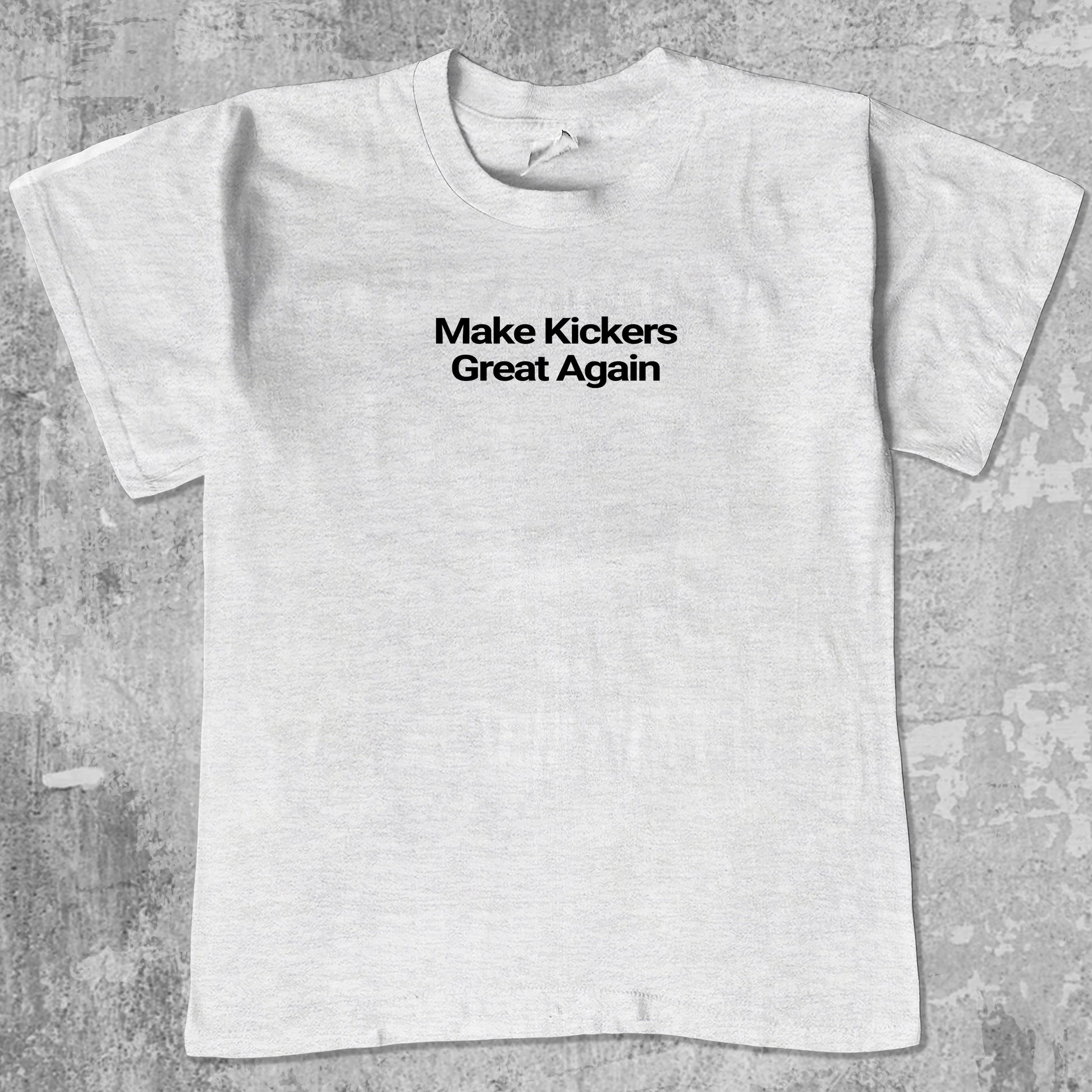 Make Kickers Great Again graphic tee with bold and humorous print, funny and trendy graphic. Perfect for adults and gift-giving. Ash Grey shirt.