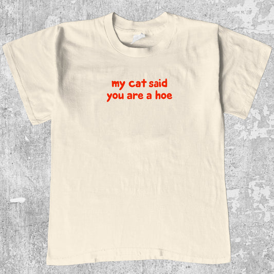 My Cat Said You Are A Hoe graphic tee with bold and humorous print, funny and trendy graphic. Perfect for adults and gift-giving. Cream shirt.
