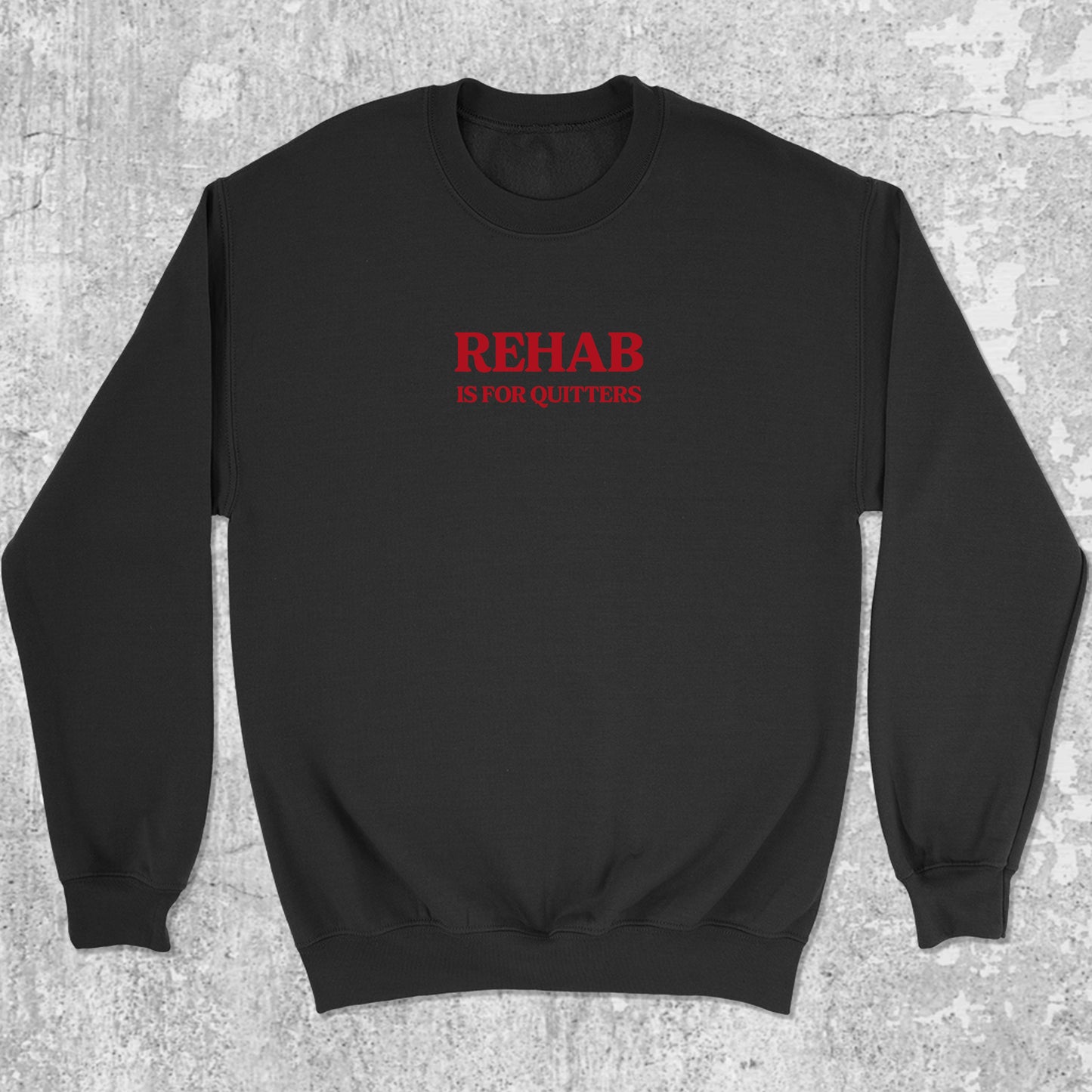 Rehab Is For Quitters graphic sweatshirt with bold and humorous print, warm and cozy graphic for everyday wear. Perfect funny gift for Christmas. Black pullover.