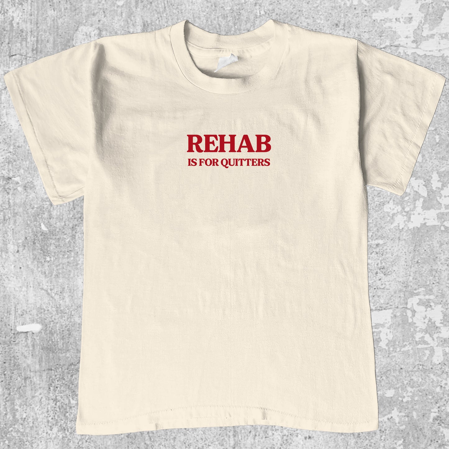 Rehab Is For Quitters graphic tee. Retro and Vintage funny quotes graphic shirts. Perfect funny gift for Christmas. Cream shirt.