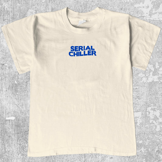 Serial Chiller graphic tee with bold and humorous print, funny and trendy graphic. Perfect for adults and gift-giving. Cream shirt.