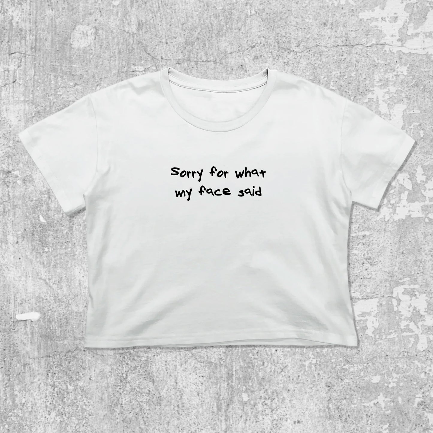 Sorry for what my face said graphic crop tee with cute and trendy fit, featuring playful vintage graphic, stylish cut. White crop t-shirt