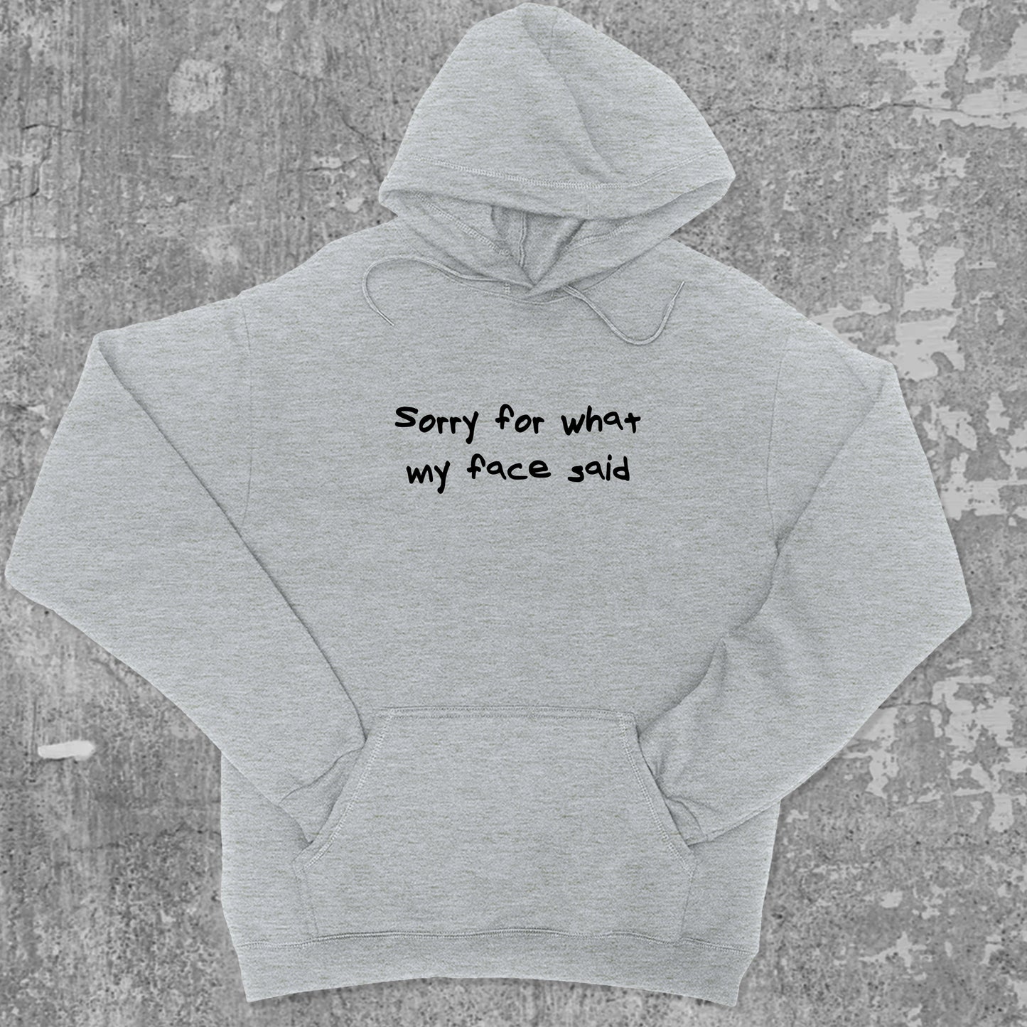 Sorry for what my face said graphic hoodie with funny and trendy artwork, casual streetwear with bold personality. Great for adults and gifting. Heather Grey hoodie.