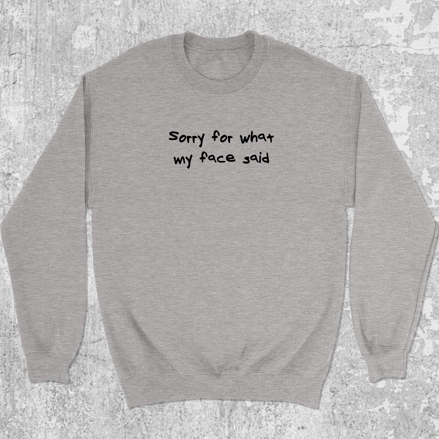 Sorry for what my face said graphic sweatshirt with bold and humorous print, warm and cozy graphic for everyday wear. Perfect funny gift for Christmas. Heather Grey pullover.