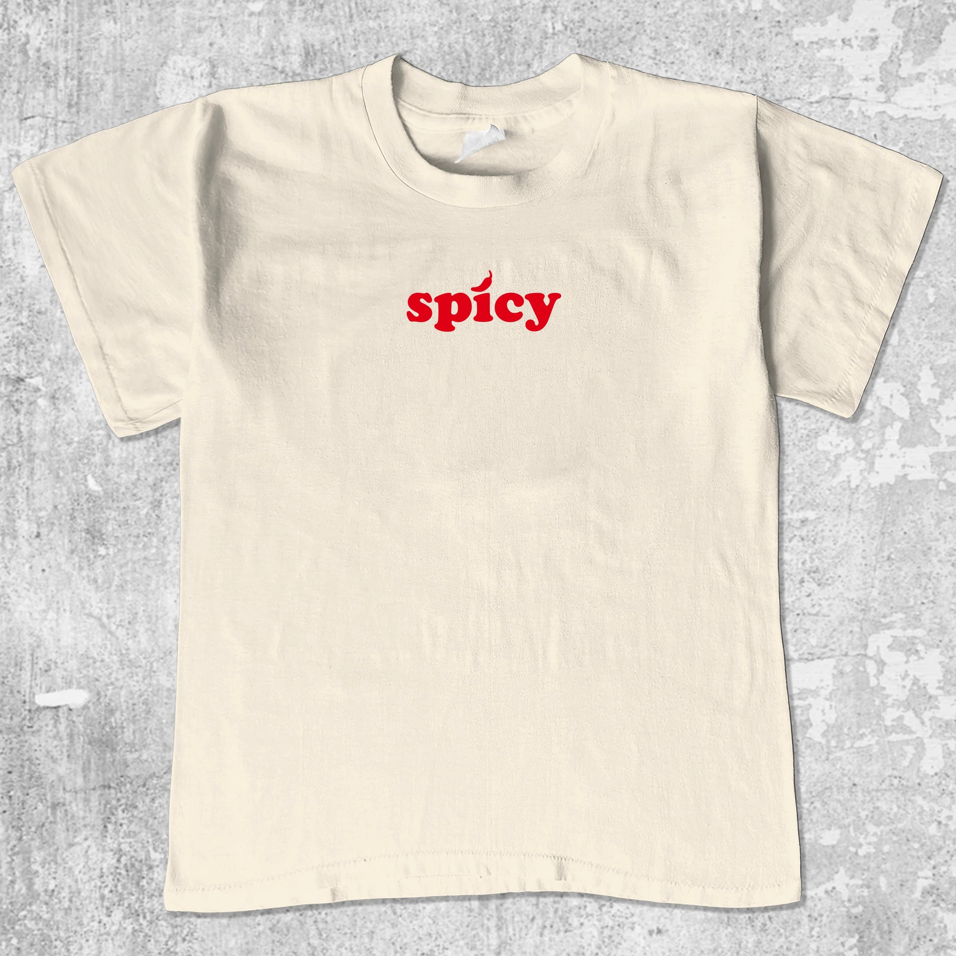 Spicy graphic tee with bold and humorous print, funny and trendy graphic. Perfect for adults and gift-giving. Cream shirt.