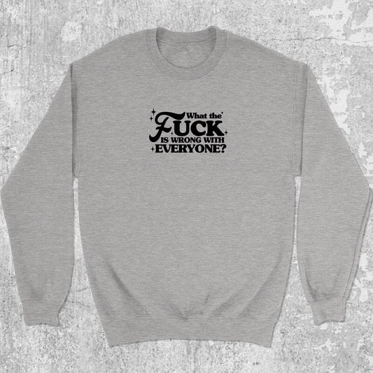 What the fuck is wrong with everyone graphic sweatshirt with bold and humorous print, warm and cozy graphic for everyday wear. Perfect for Christmas gifts for friends and family. Heather Grey pullover.