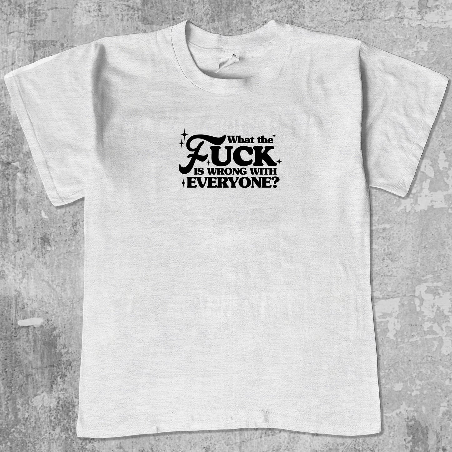 What the fuck is wrong with everyone graphic tee with bold and humorous print, funny and trendy graphic. Perfect for Christmas gifts for friends and family. Ash Grey shirt.