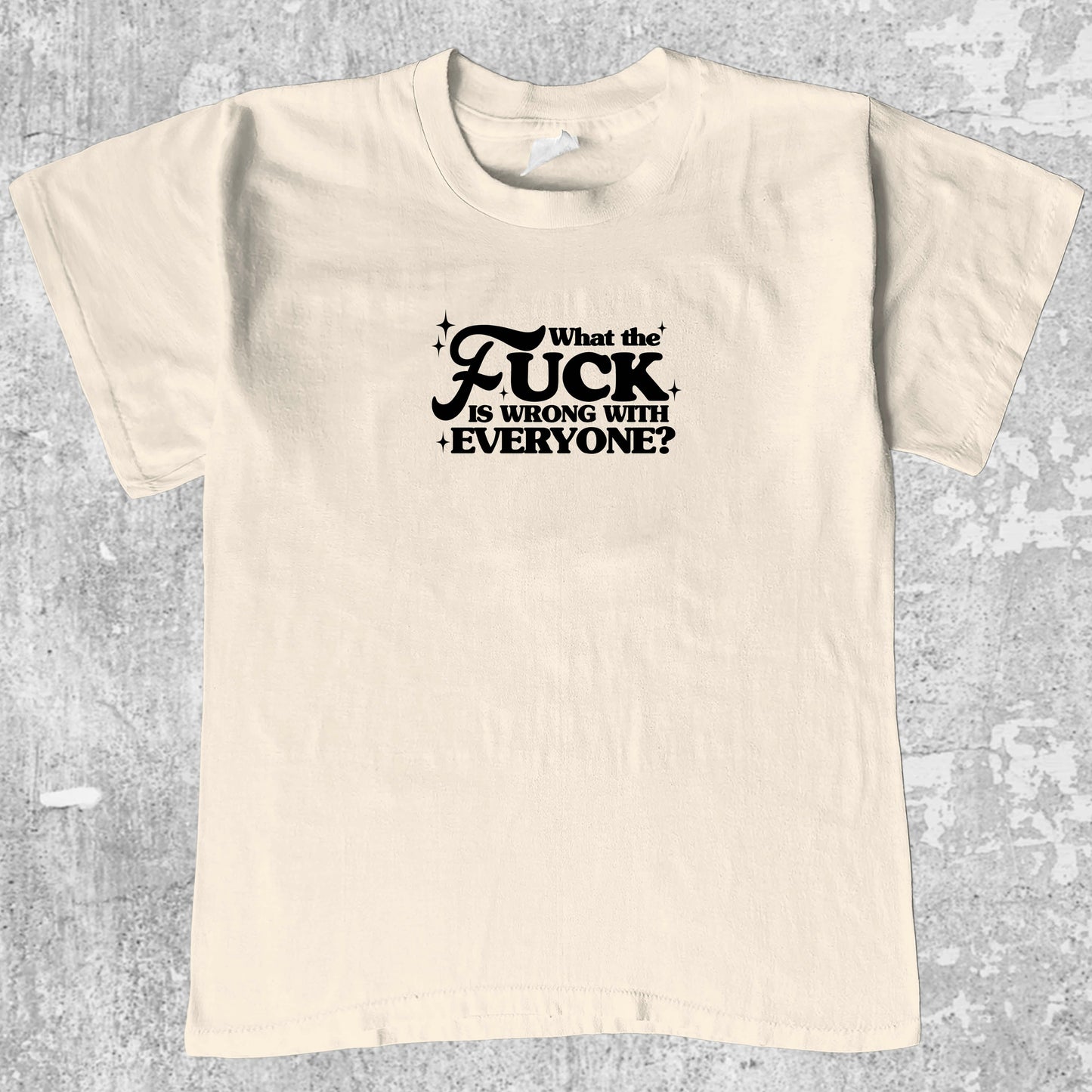What the fuck is wrong with everyone graphic tee with bold and humorous print, funny and trendy graphic. Perfect for Christmas gifts for friends and family. Cream shirt.