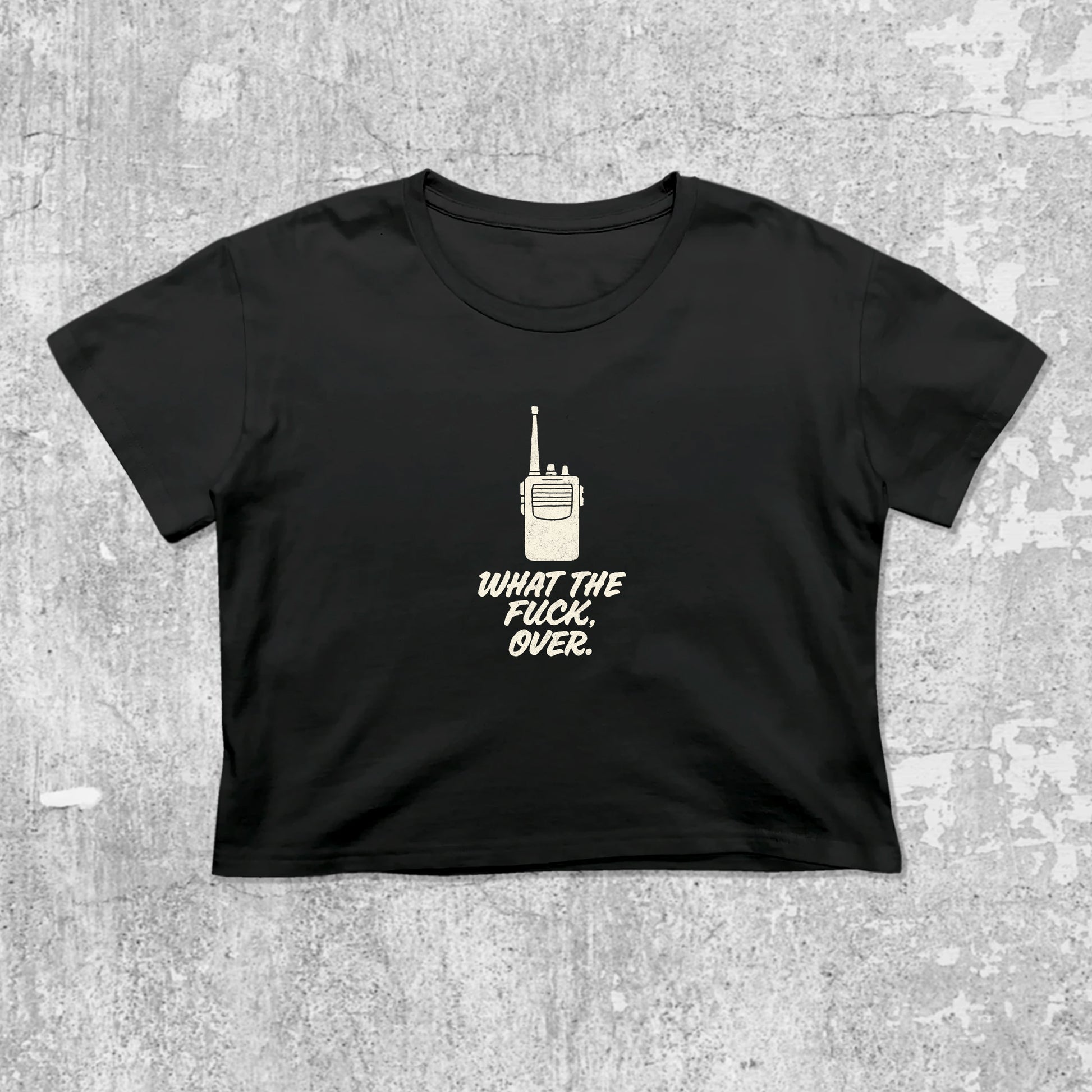 What The Fuck Over graphic crop tee with cute and trendy fit, featuring playful vintage graphic, stylish cut. Black crop t-shirt
