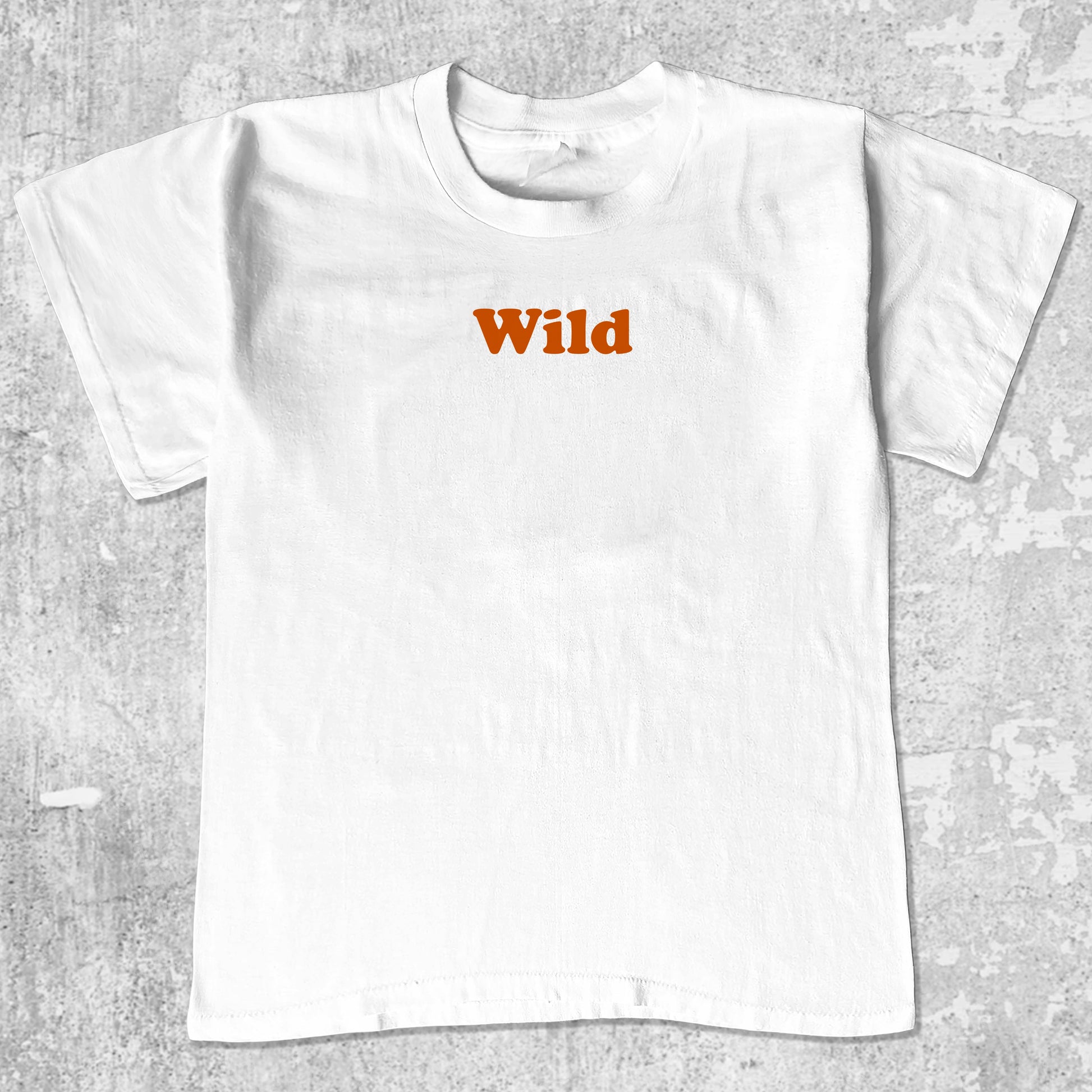 Wild graphic tee with bold and humorous print, funny and trendy graphic. Perfect for adults and gift-giving. White shirt.