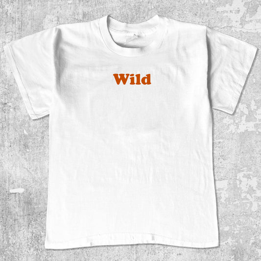 Wild graphic tee with bold and humorous print, funny and trendy graphic. Perfect for adults and gift-giving. White shirt.
