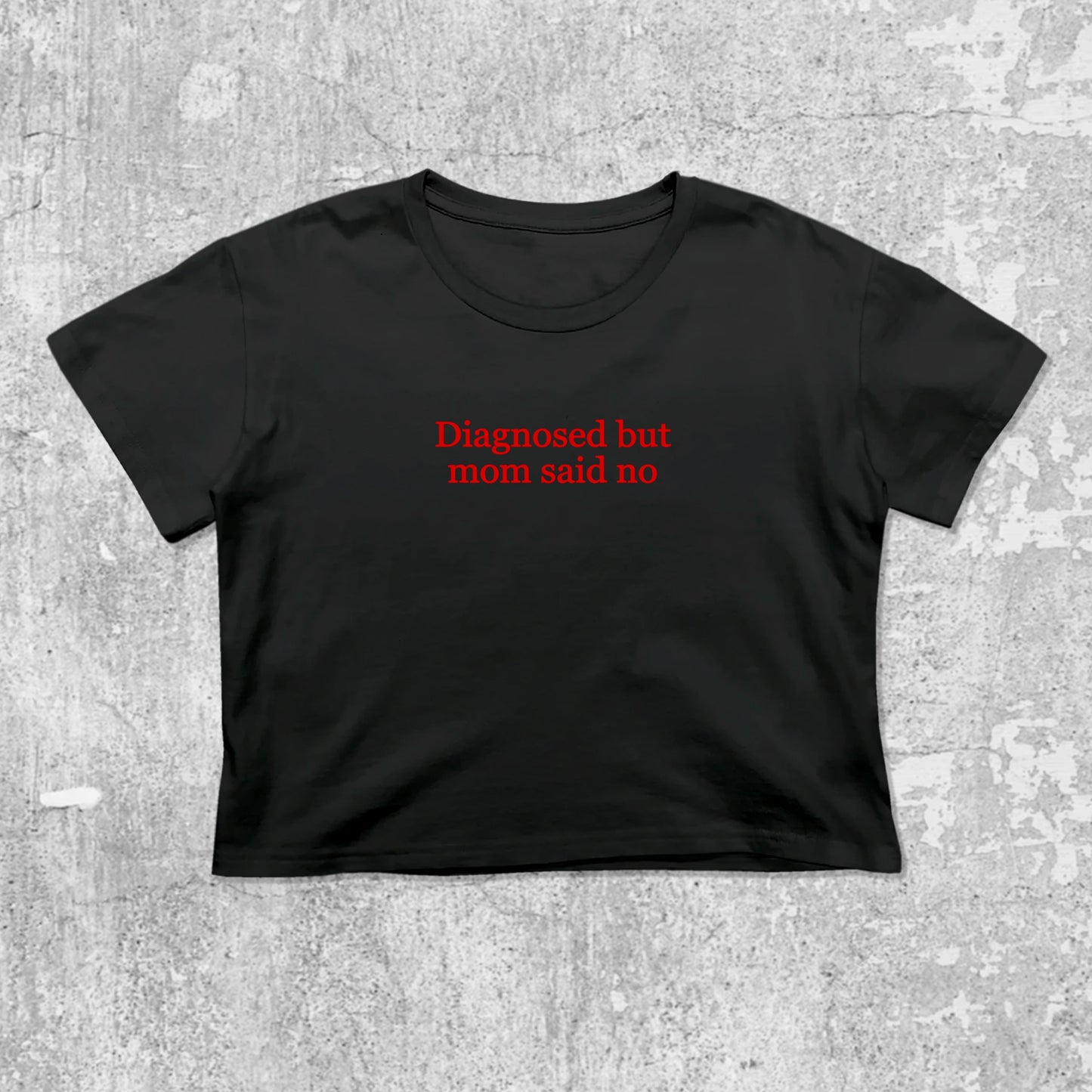 Diagnosed But Mom Said No graphic crop tee with cute and trendy fit, featuring playful vintage graphic, stylish cut. Black crop t-shirt