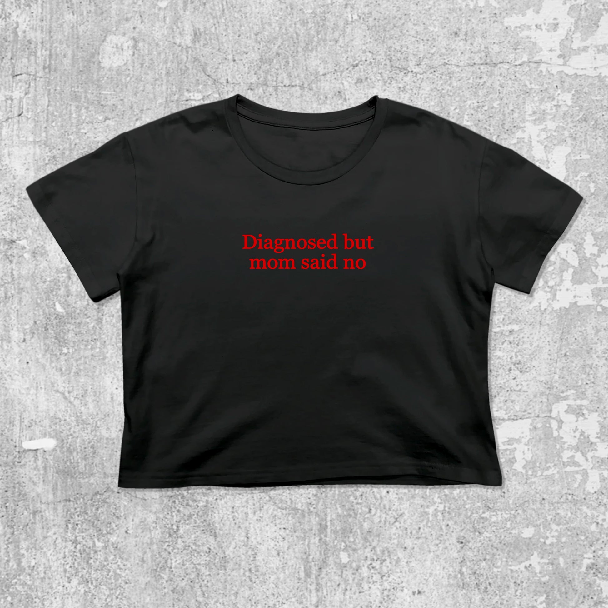 Diagnosed But Mom Said No graphic crop tee with cute and trendy fit, featuring playful vintage graphic, stylish cut. Black crop t-shirt