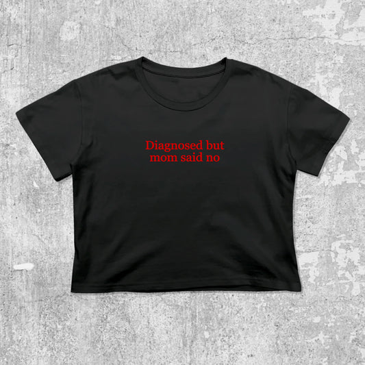 Diagnosed But Mom Said No graphic crop tee with cute and trendy fit, featuring playful vintage graphic, stylish cut. Black crop t-shirt