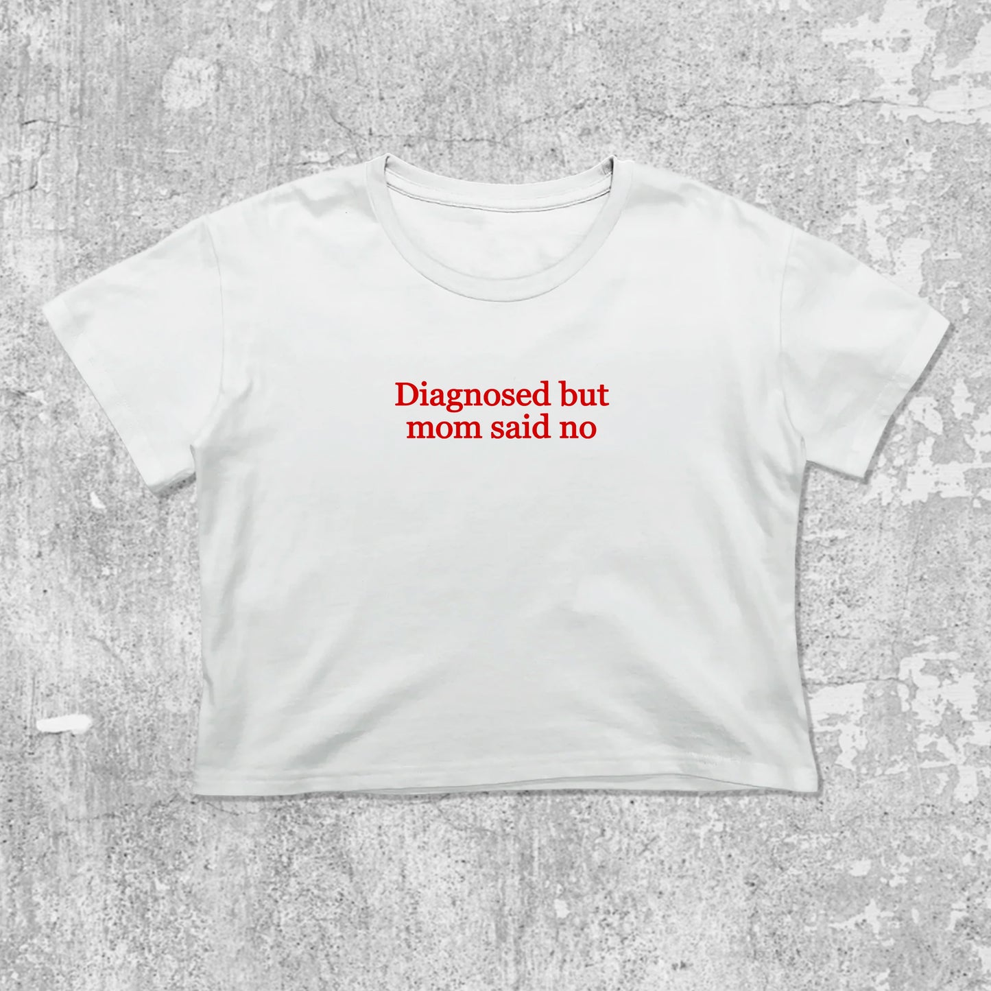 Diagnosed But Mom Said No graphic crop tee with cute and trendy fit, featuring playful vintage graphic, stylish cut. White crop t-shirt
