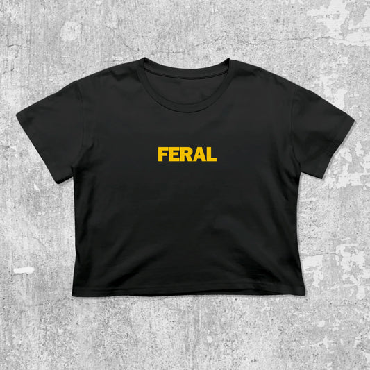 Feral graphic crop tee with cute and trendy fit, featuring playful vintage graphic, stylish cut. Black crop t-shirt