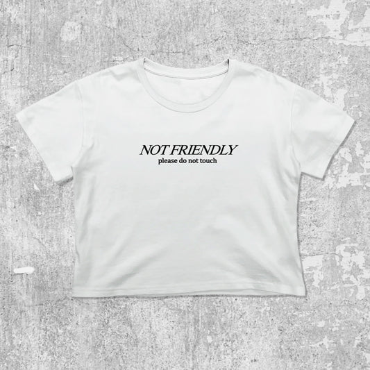 Not Friendly Please Do Not Touch graphic crop tee with cute and trendy fit, featuring playful vintage graphic, stylish cut. White crop t-shirt