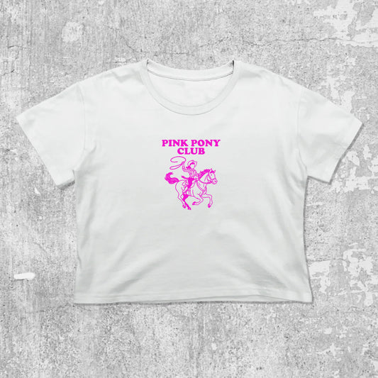 Pink Pony Club graphic crop tee with cute and trendy fit, featuring playful vintage graphic, stylish cut. White crop t-shirt