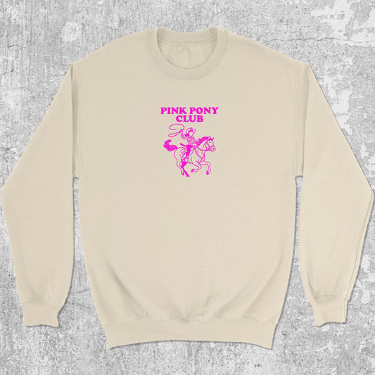 Pink Pony Club graphic sweatshirt with bold and humorous print, warm and cozy graphic for everyday wear. Perfect for adults and gift-giving. Natural pullover.