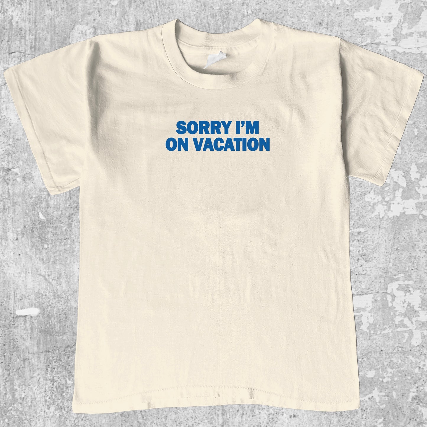 Sorry i'm on vacation graphic tee with bold and humorous print, funny and trendy graphic. Perfect gifts for friends and family. Cream shirt.